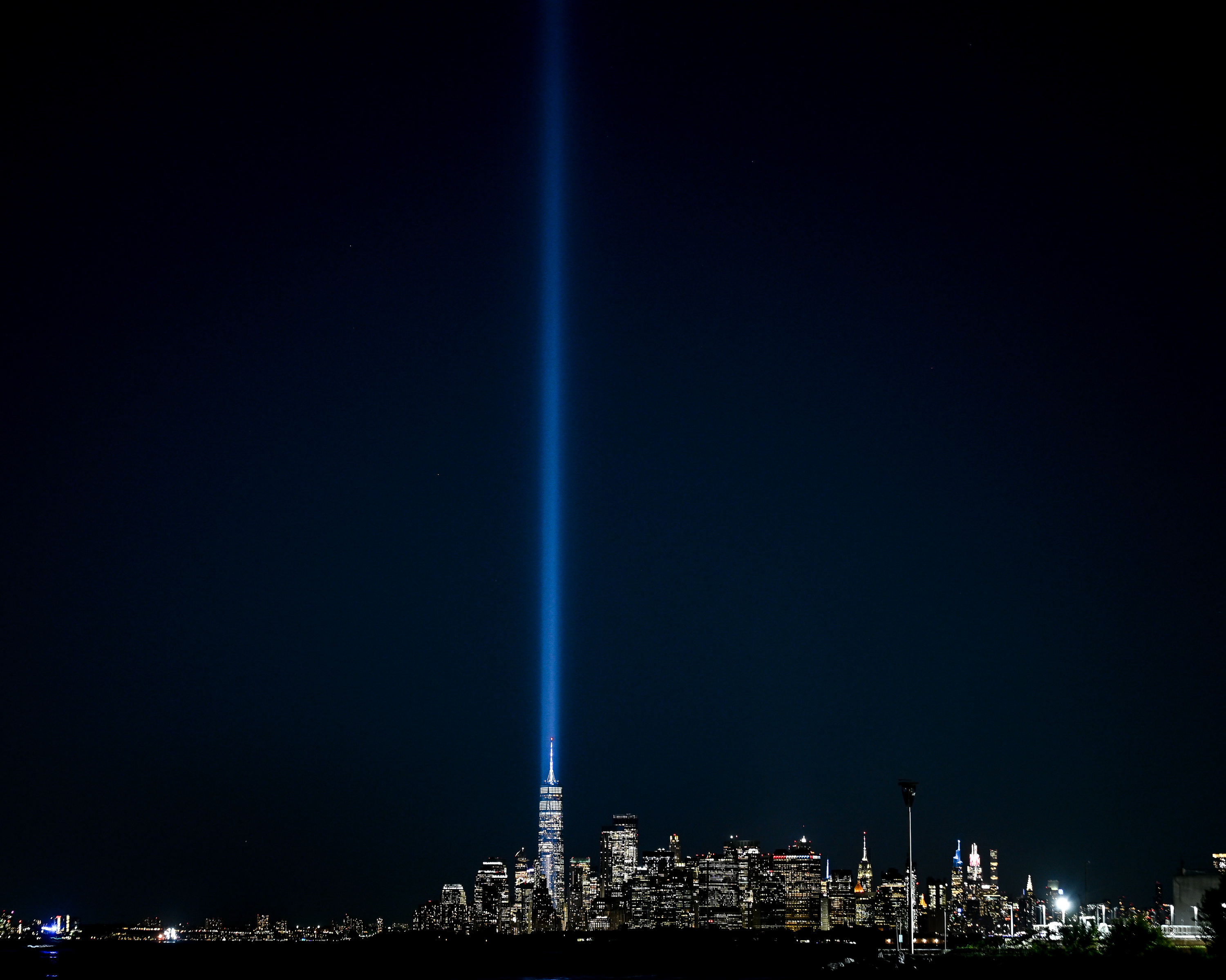 Flyer for American Veterans Memorial Pier Remembrance Vigil