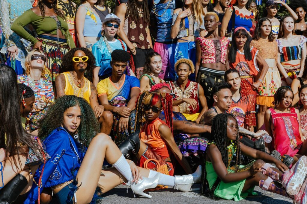 Flyer for Carnaval NYC brings a 70-model fashion procession to Maria Hernandez Park